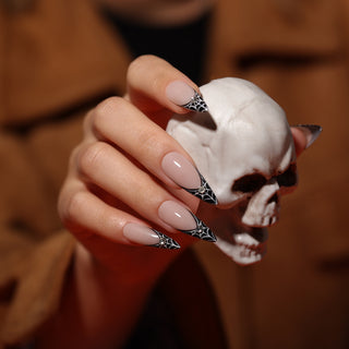 From Glow-in-the-Dark to Gothic French Nail Your Halloween Look