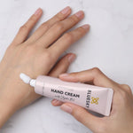 Bluesky Hand Cream being applied to the back of a hand for full moisturisation.